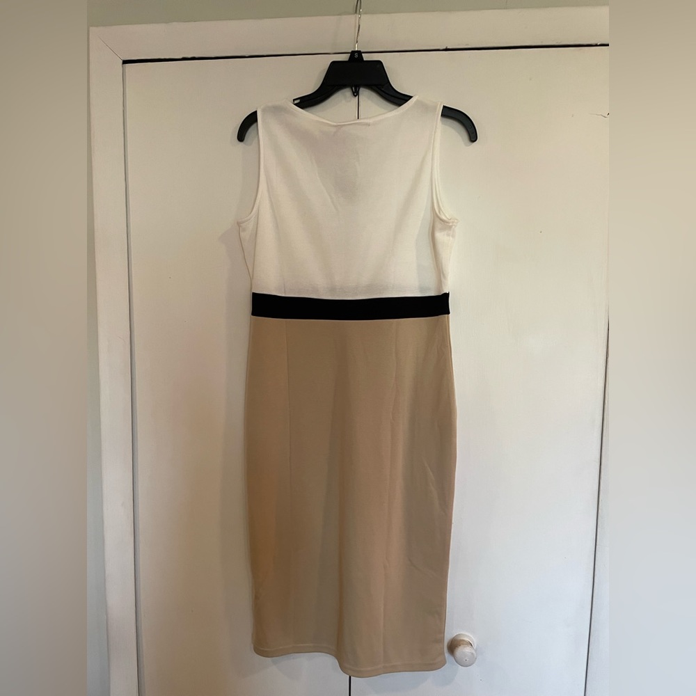 Beautiful tan, black & white sleeveless Miusiol dress size Large with tags.